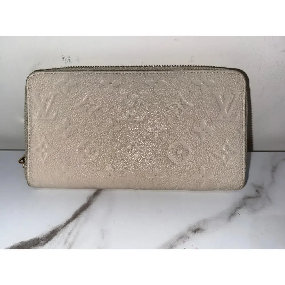 Louis Vuitton Zippy Wallet in Cream Empreinte Leather